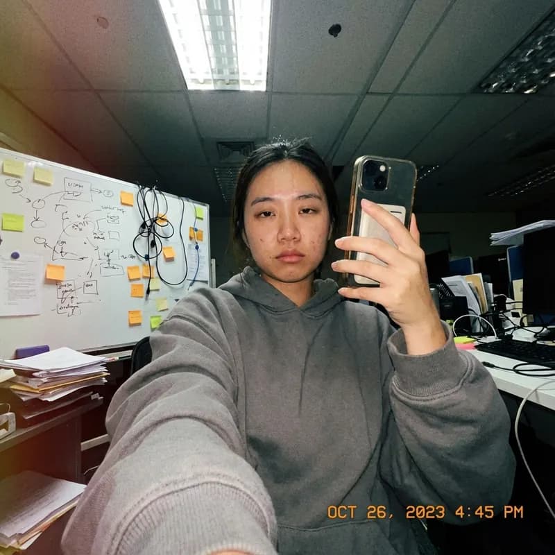 Casual selfie from conference, poor lighting