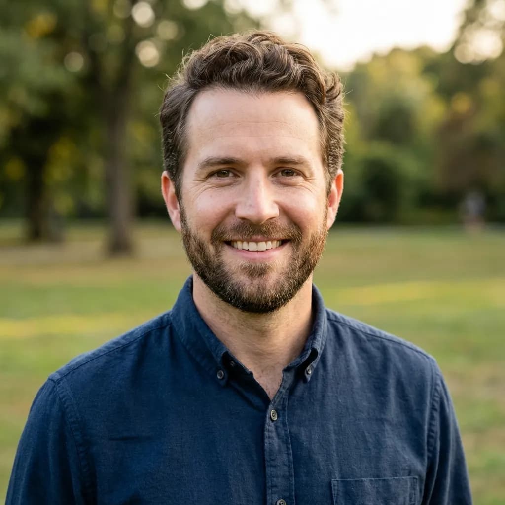 Great dating app photo example showing professional quality, good lighting, confident expression, and approachable style that gets more matches