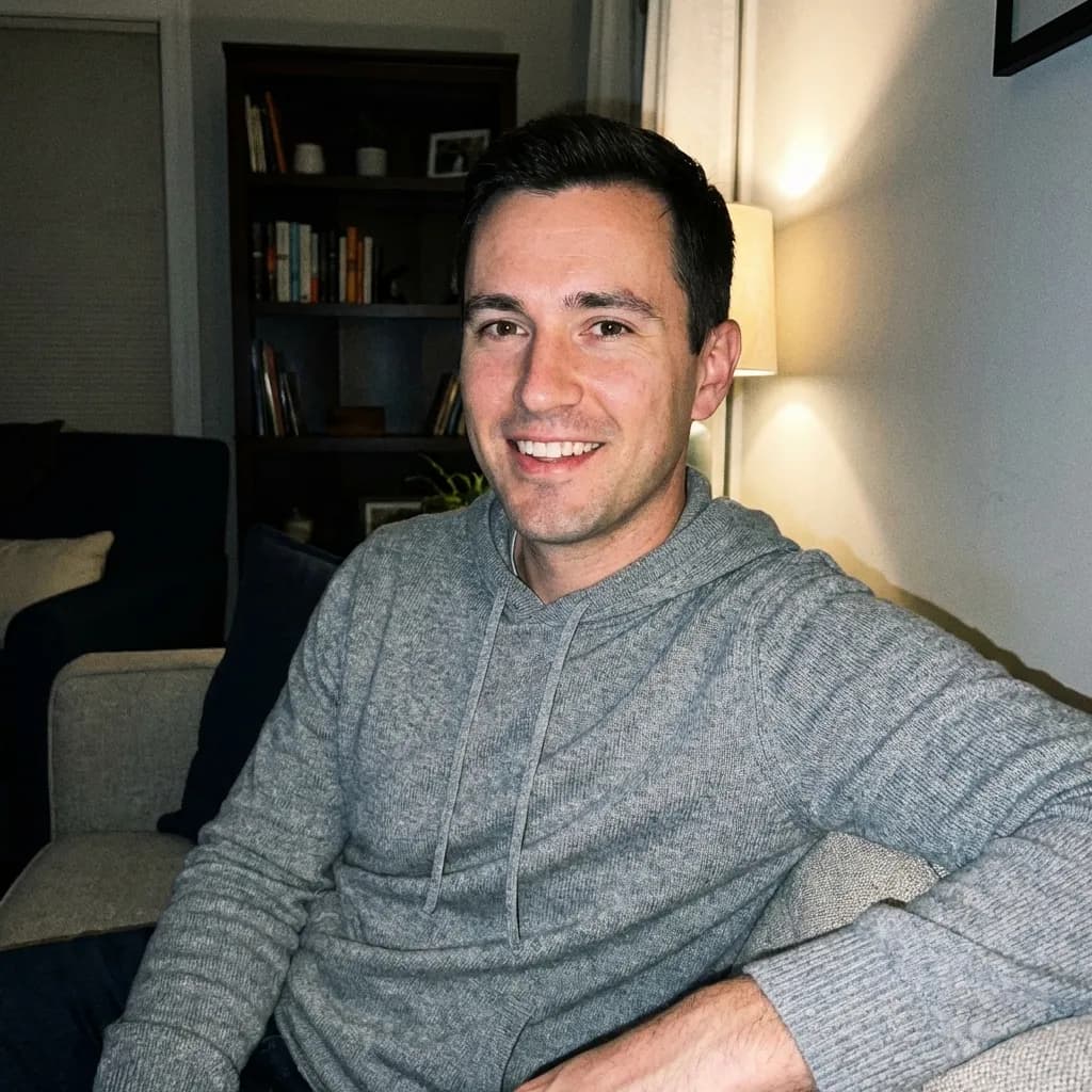 Poor LinkedIn photo example showing dark lighting, casual attire, poor quality, and unprofessional appearance